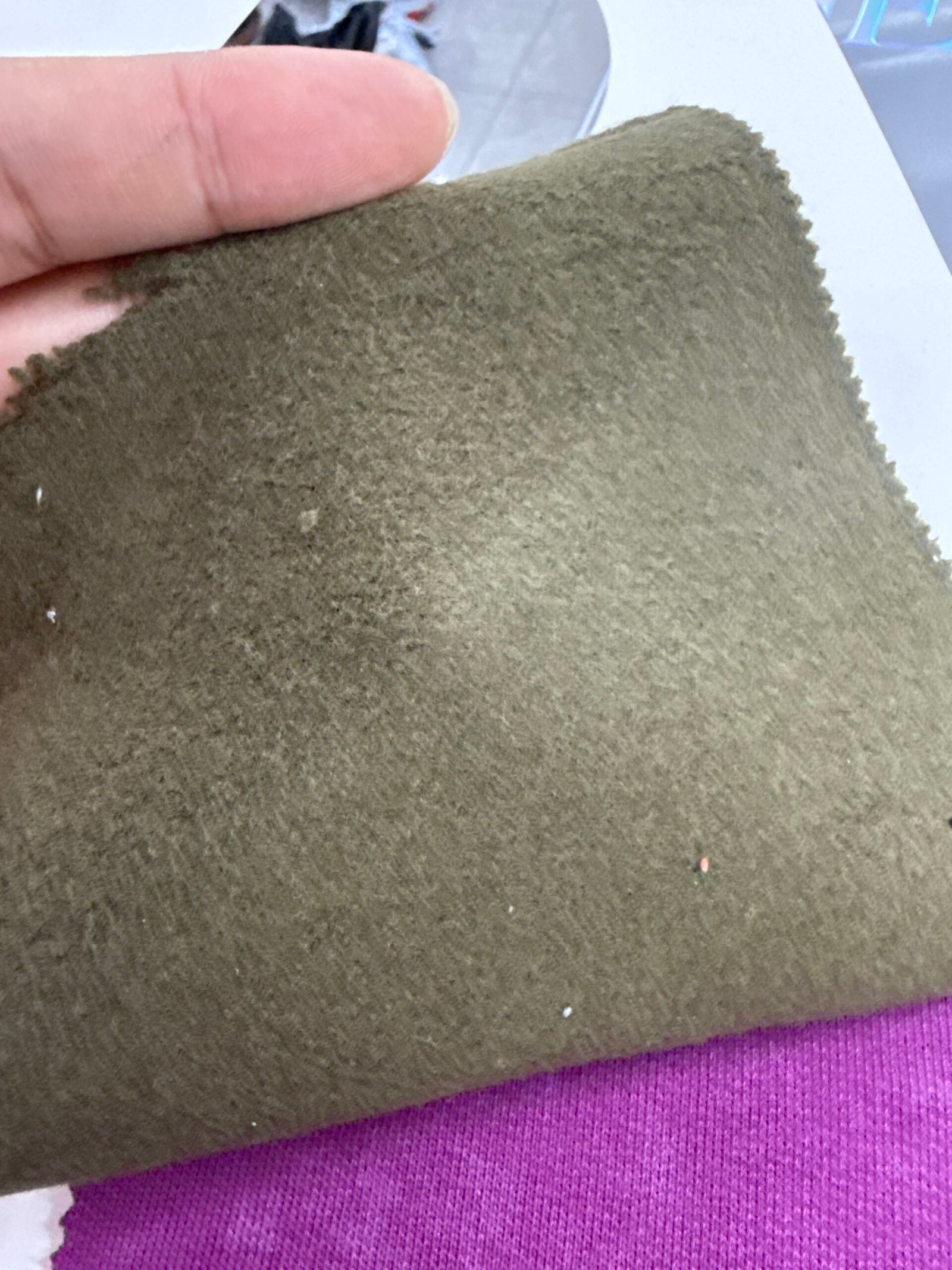Heavyweight brushed fleece fabric sample for hoodie manufacturing at DeCheng Garment