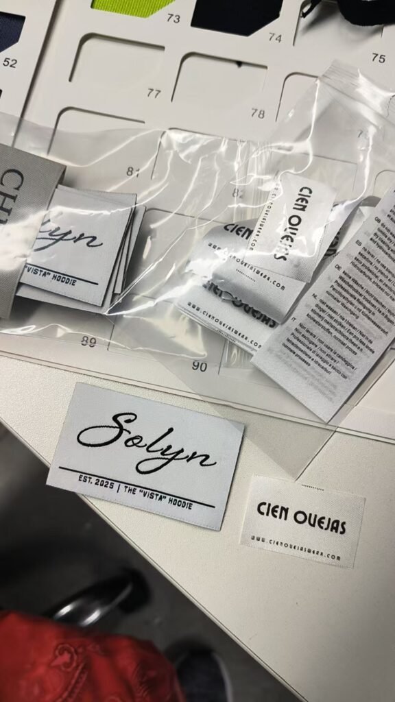 Custom woven labels for private label t-shirt brands manufactured at DeCheng Garment