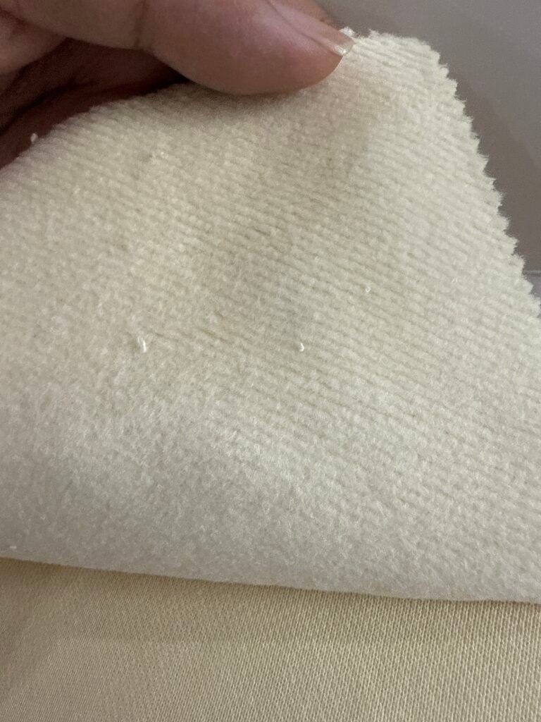 Brushed fleece fabric showing inner soft texture for heavyweight hoodie manufacturing